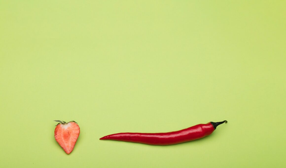 red chili on green surface