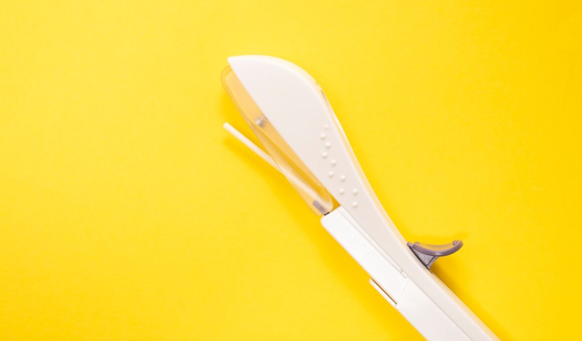 white plastic ornament on yellow surface